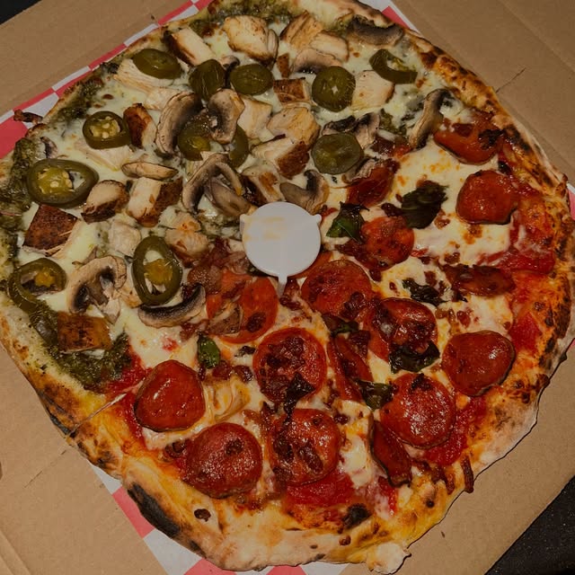 Giani’s wood-fired pizza with pepperoni, mushrooms, chicken and jalapeños